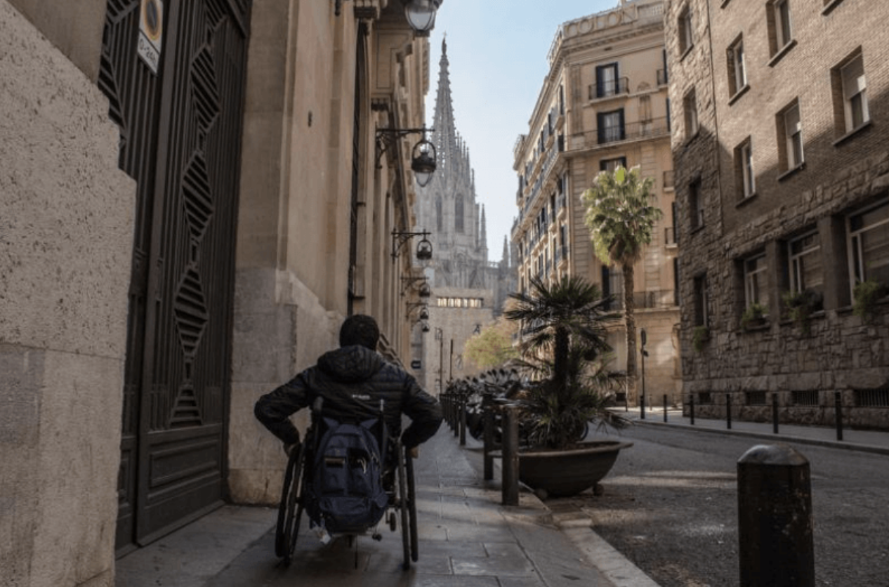 A wheelchair traveler roaming the streets of Barcelona