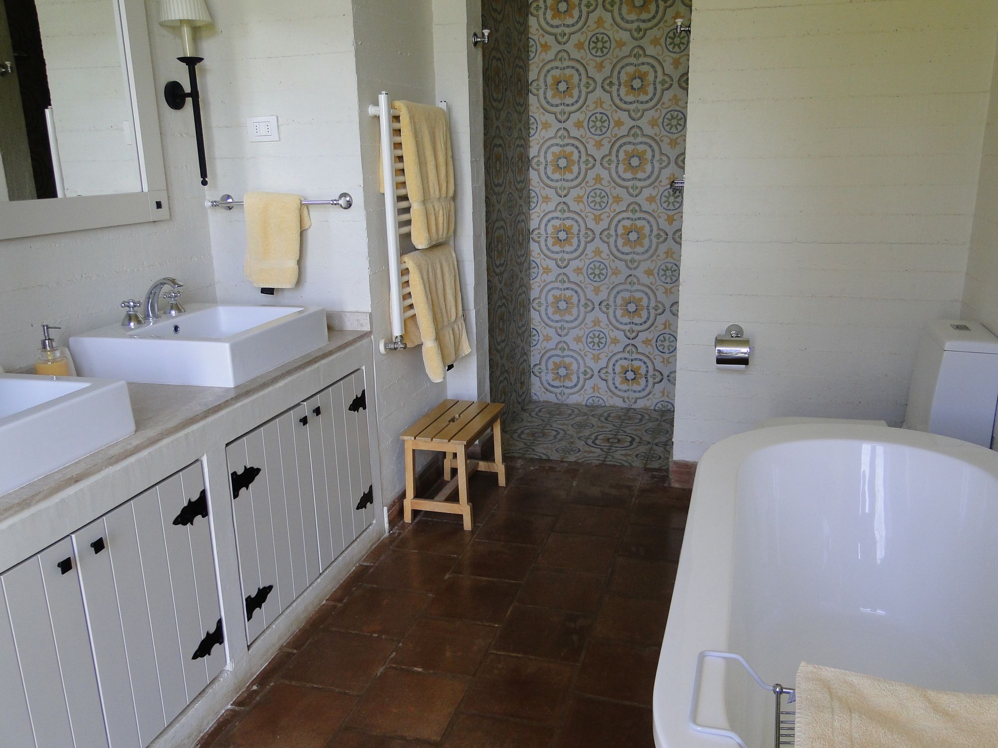 An accessible bathroom with a roll-in shower