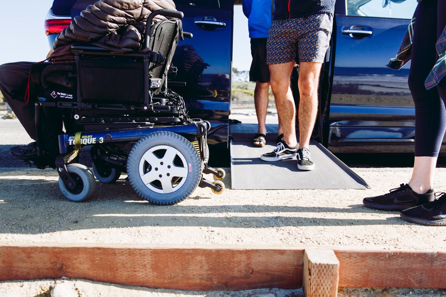 Wheelchair accessible transportation van with a ramp