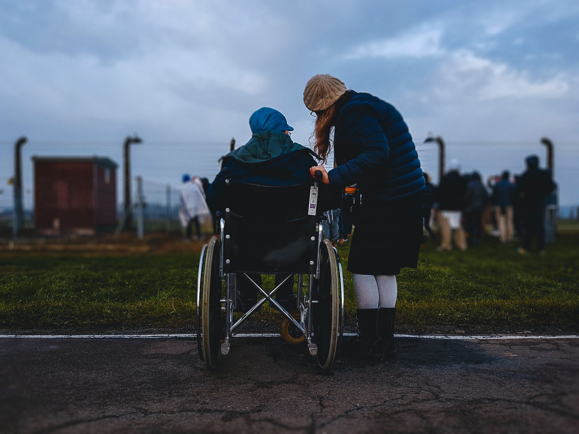 A wheelchair-user and their companion, taking in the views. A good example of celebrating disability pride month