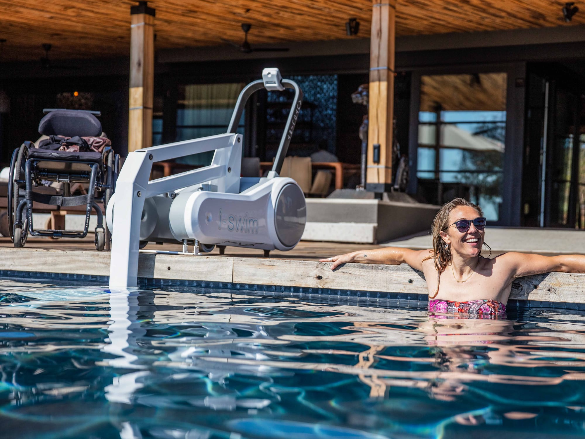 Sophie Morgan enjoying the pool amenities with a pool lift in South Africa