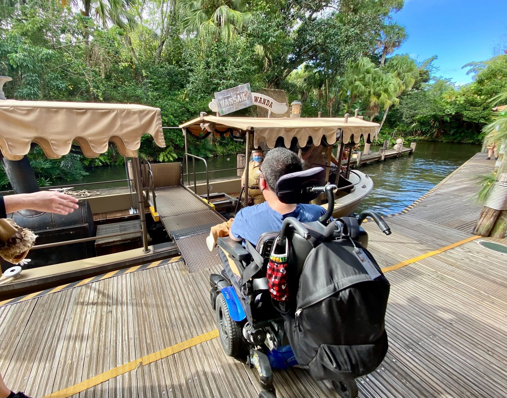 Wheelchair-user entering attraction via ramp at Disney World