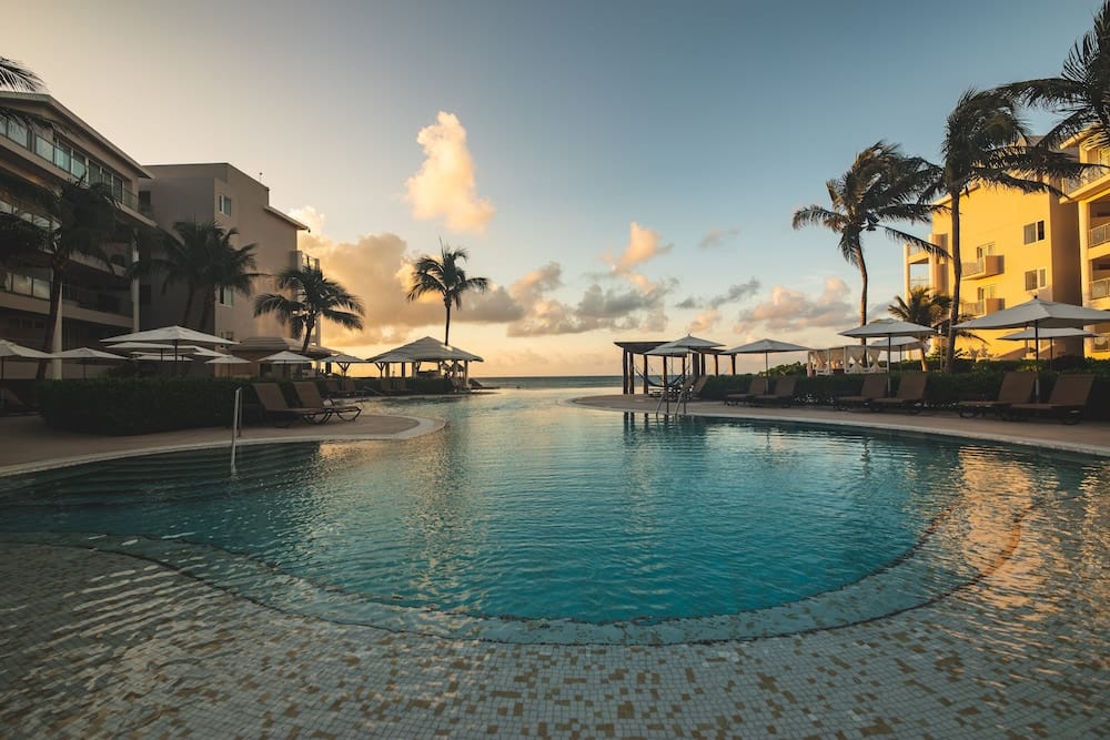 Outdoor pool overlooking the ocean at Dreams Jade Resort & Spa in Mexico