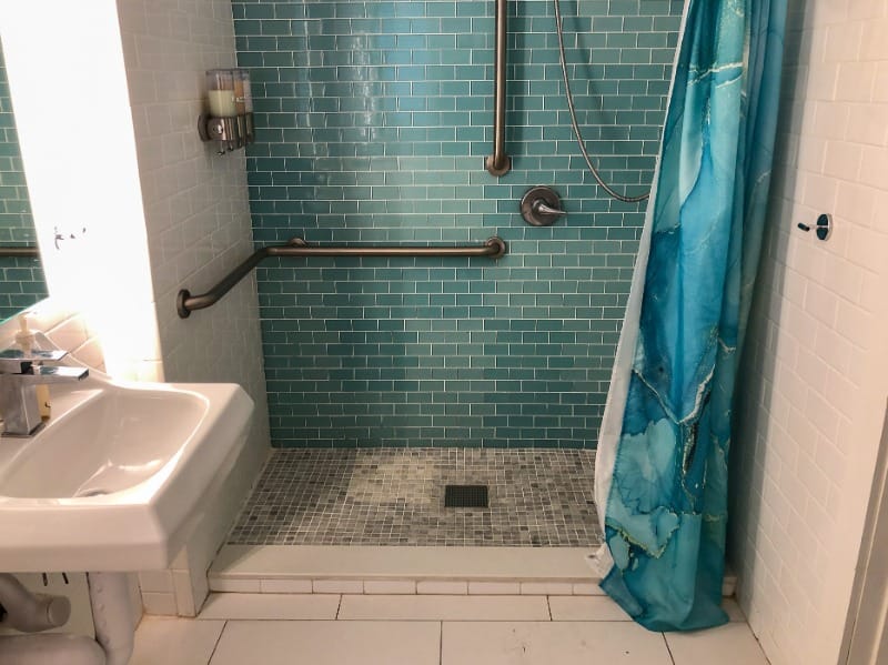 Accessible roll-in shower at The Salty Mermaid Oceanfront Hotel