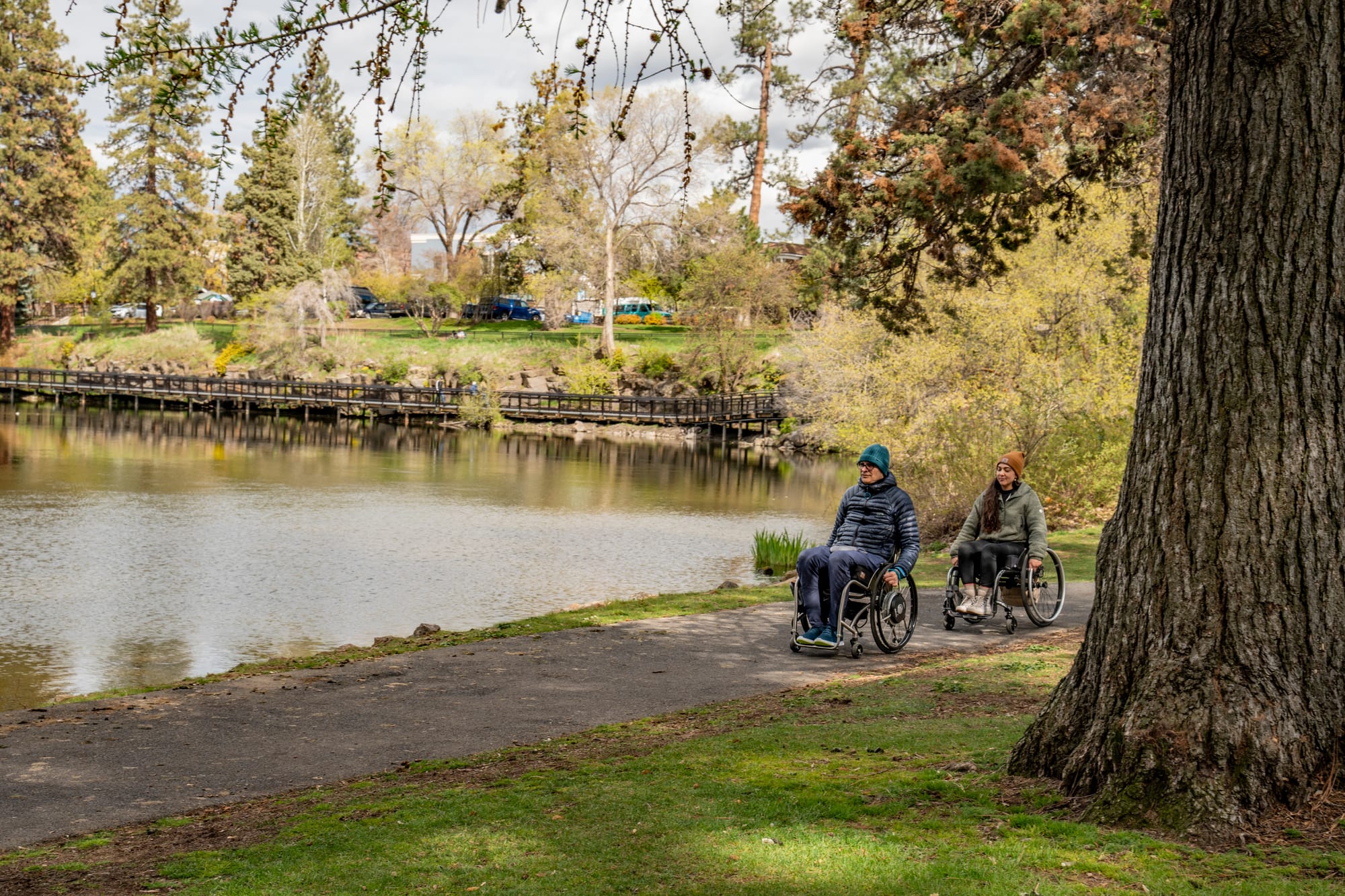 Wheelchair users on accessible trails in Bend