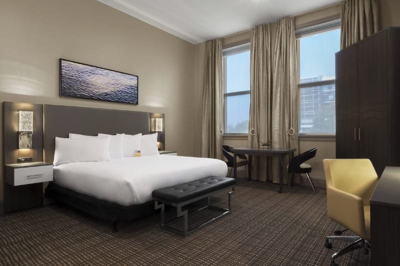 Wheelchair accessible room with a low bed height at The Current Iowa, Autograph Collection