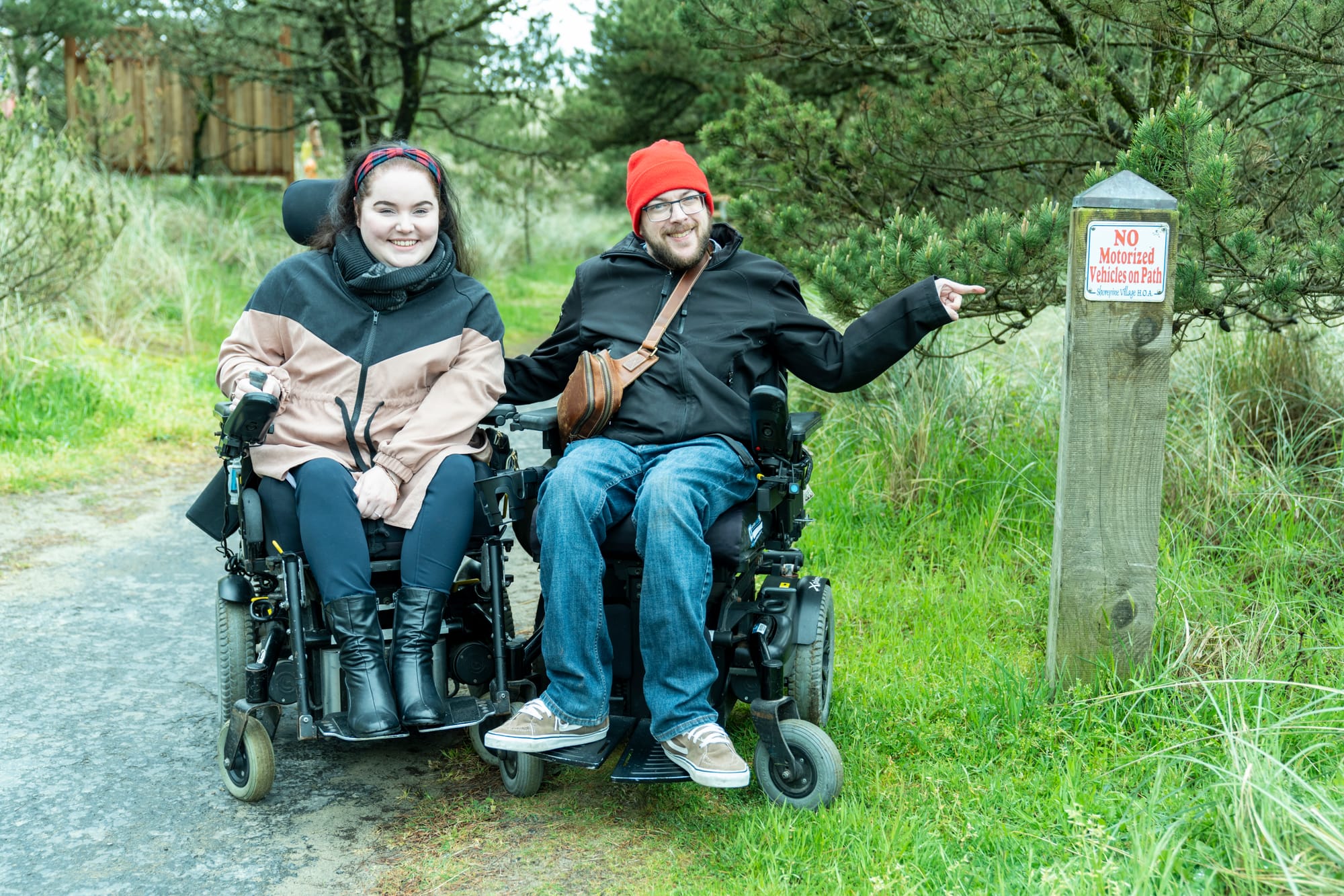 Two wheelchair users enjoying their time in Tillamook Coast