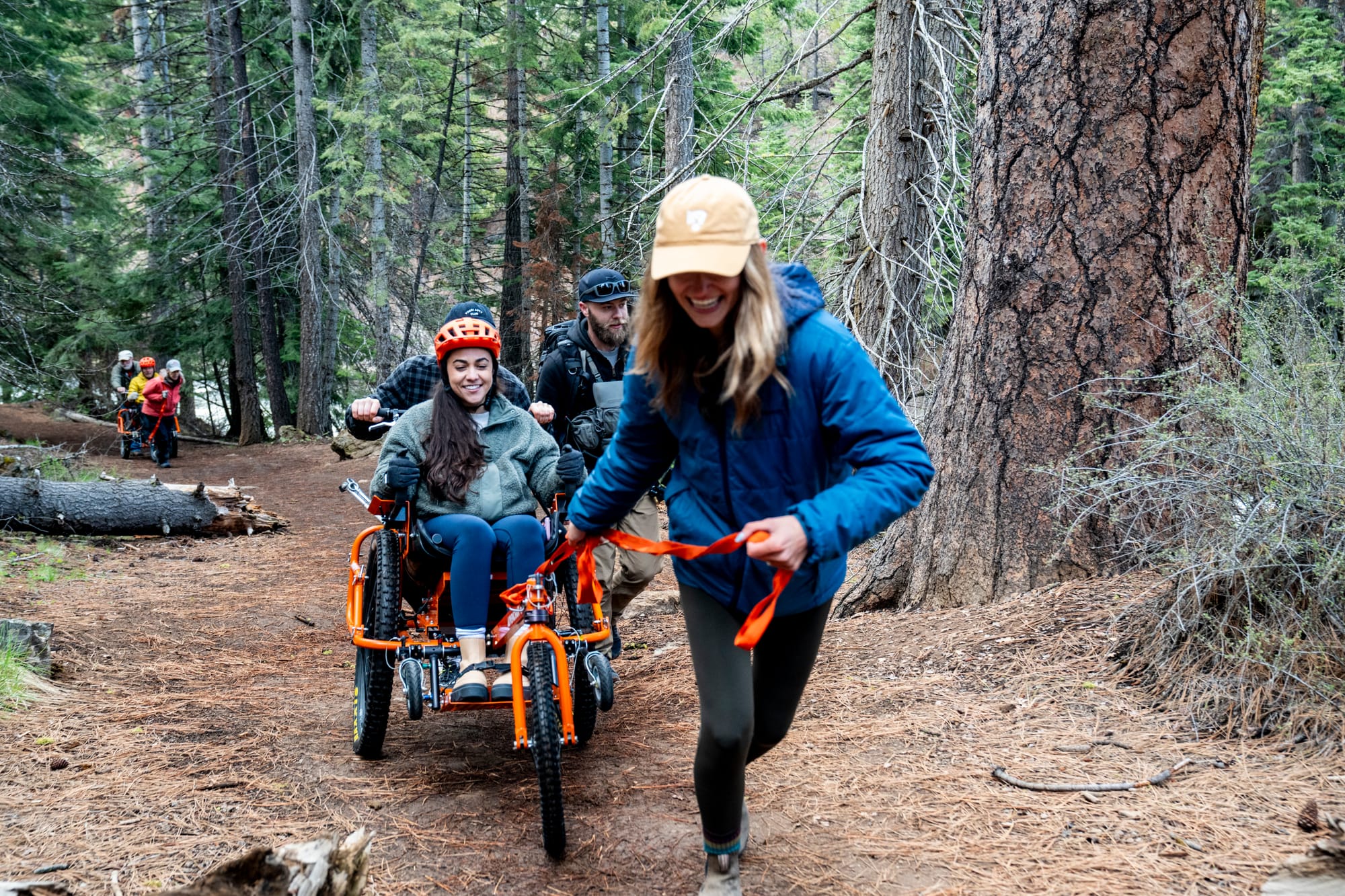 Wheelchair user using an all-terrain wheelchair on accessible trails in Central Oregon