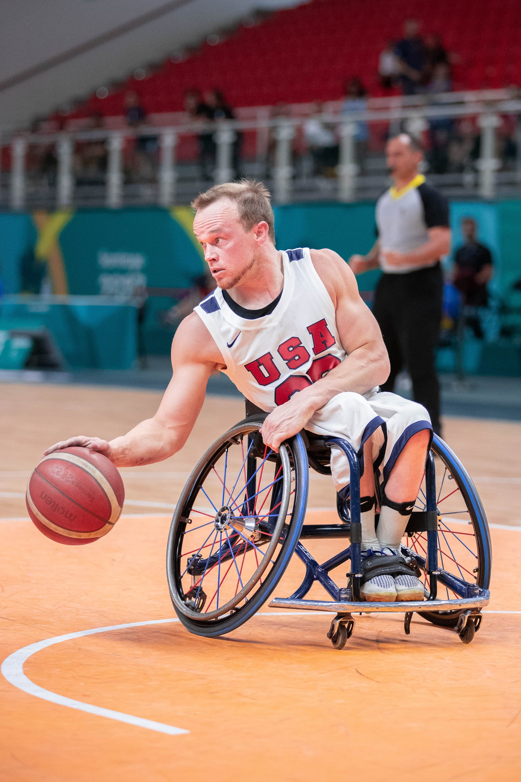 John Boie dribbling the basketball during a game at the Paralympics