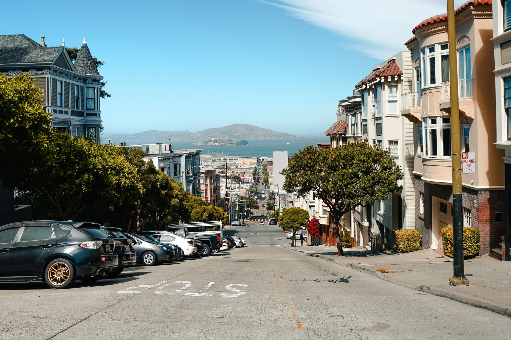 San Francisco street views with ocean and hills in the distance