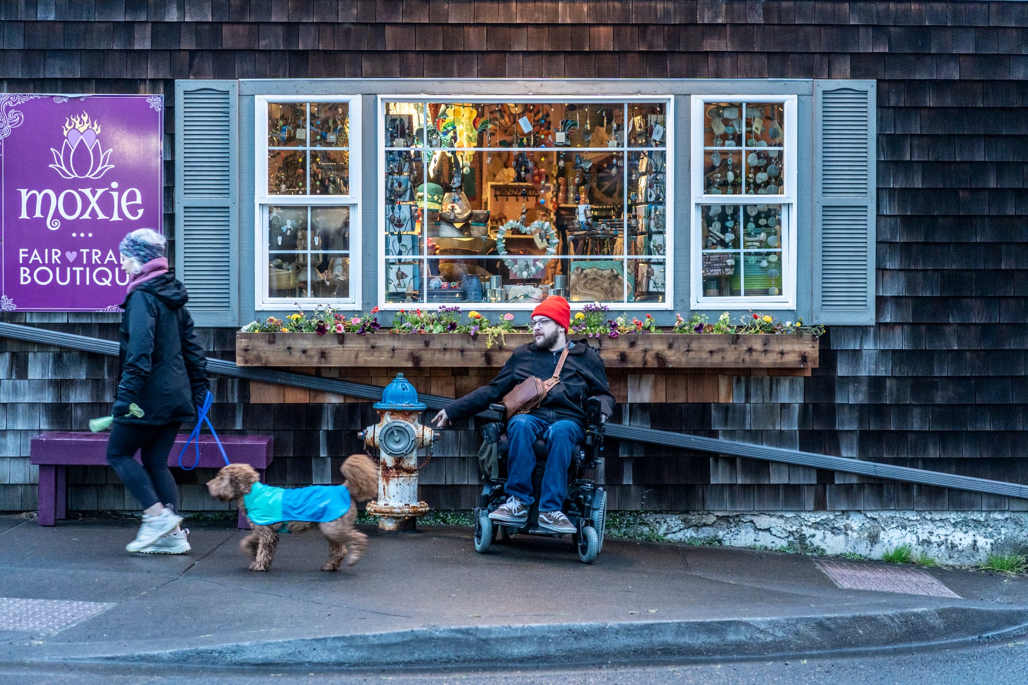 Wheelchair user in downtown Manzanita, Oregon