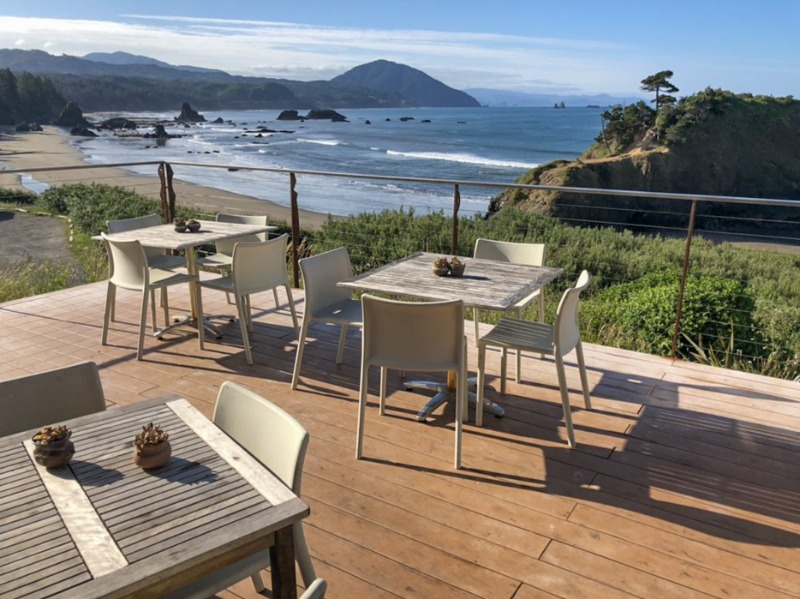 Redfish restaurant patio overlooking the ocean is an accessible dining experience in Port Orford, Oregon