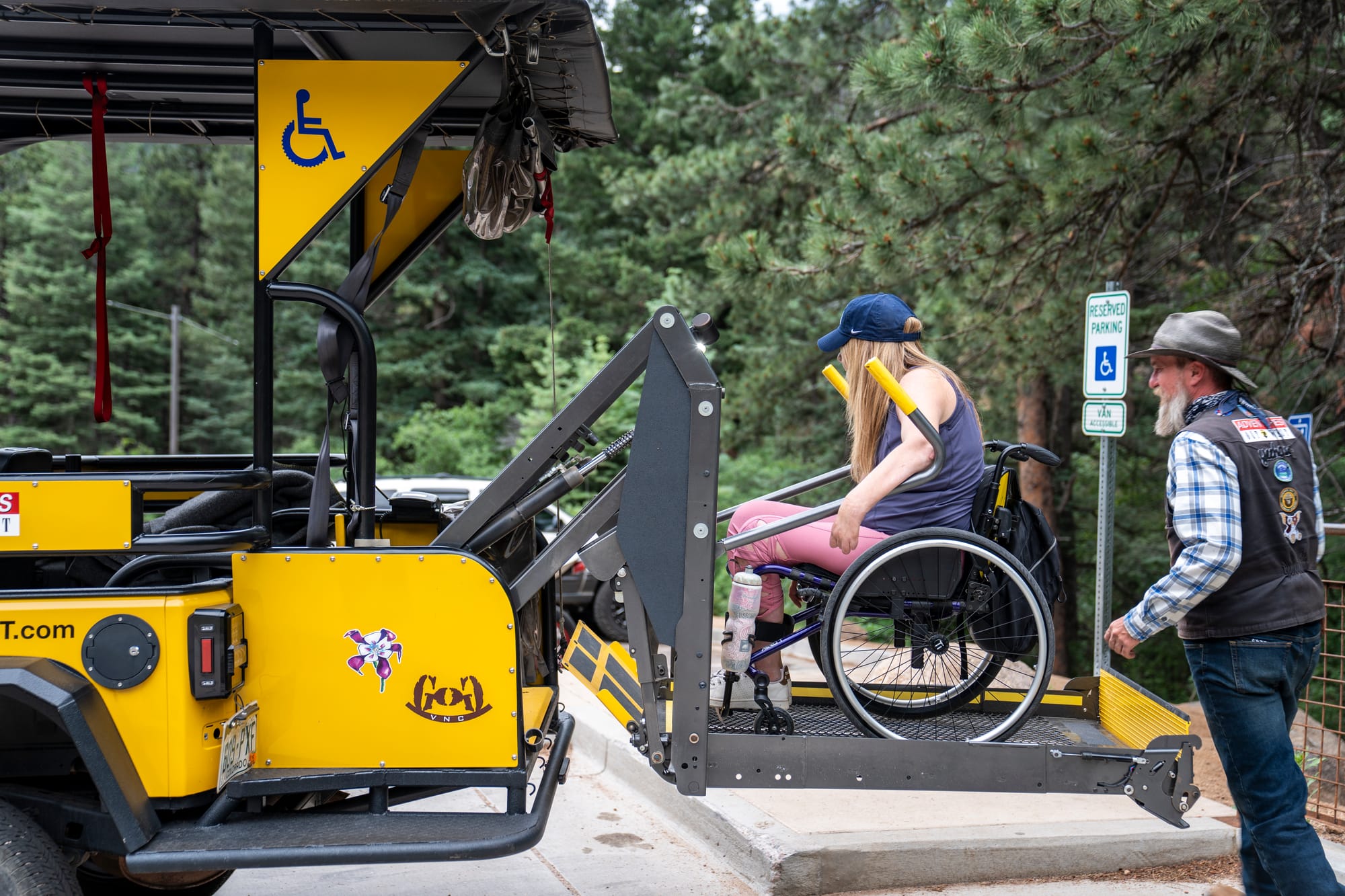 Wheelchair user using a wheelchair lift on a Jeep tour in Colorado Springs