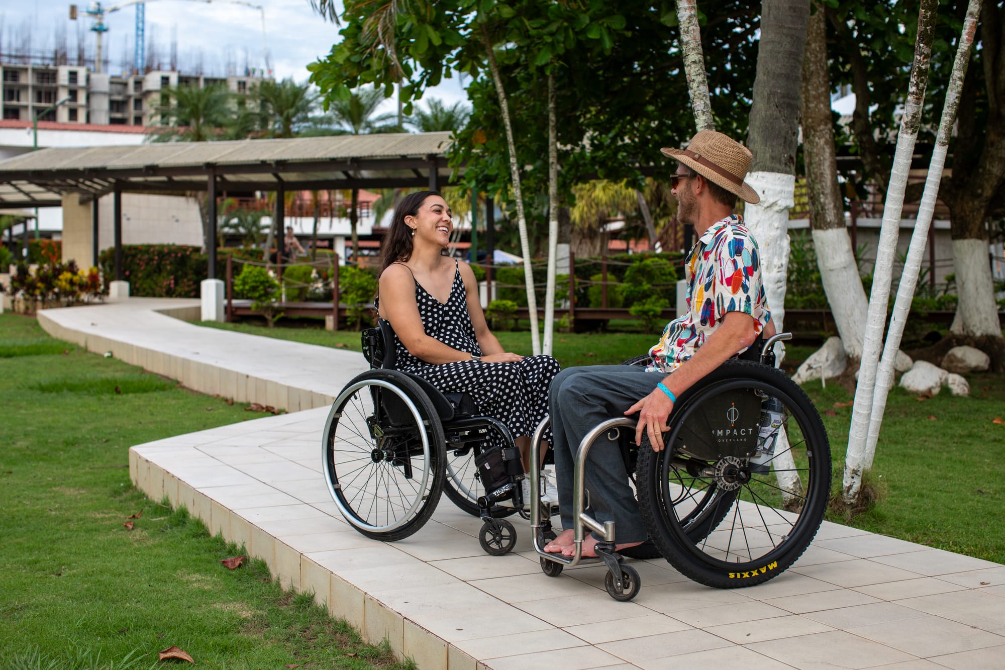 Two wheelchair users enjoying an accessible trip to Costa Rica