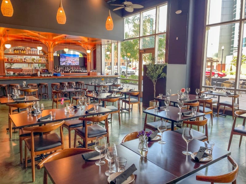 Modern dining area of Dimi's Greek House in Kalamazoo