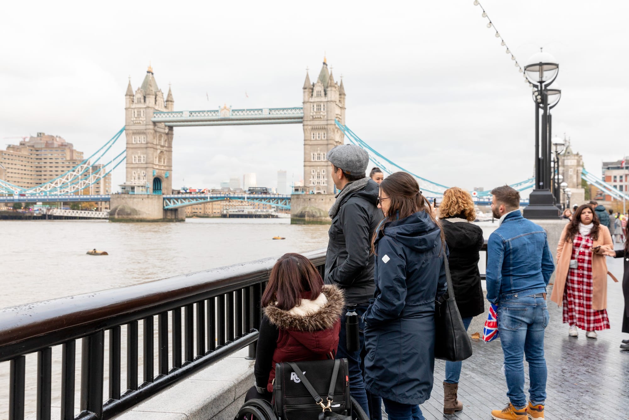 Wheelchair user and companions viewing the London Bridge