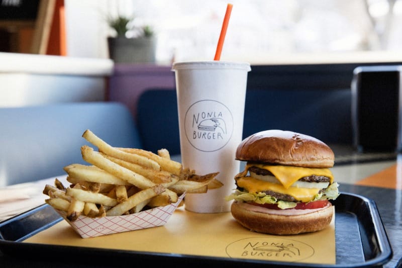 Double cheeseburger with fries and a drink at Nonla Burger in Kalamazoo