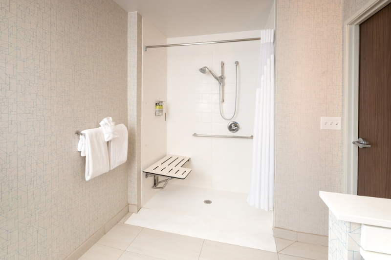 Roll-in shower, shower sear and grab bars at Holiday Inn Express in Kalamazoo