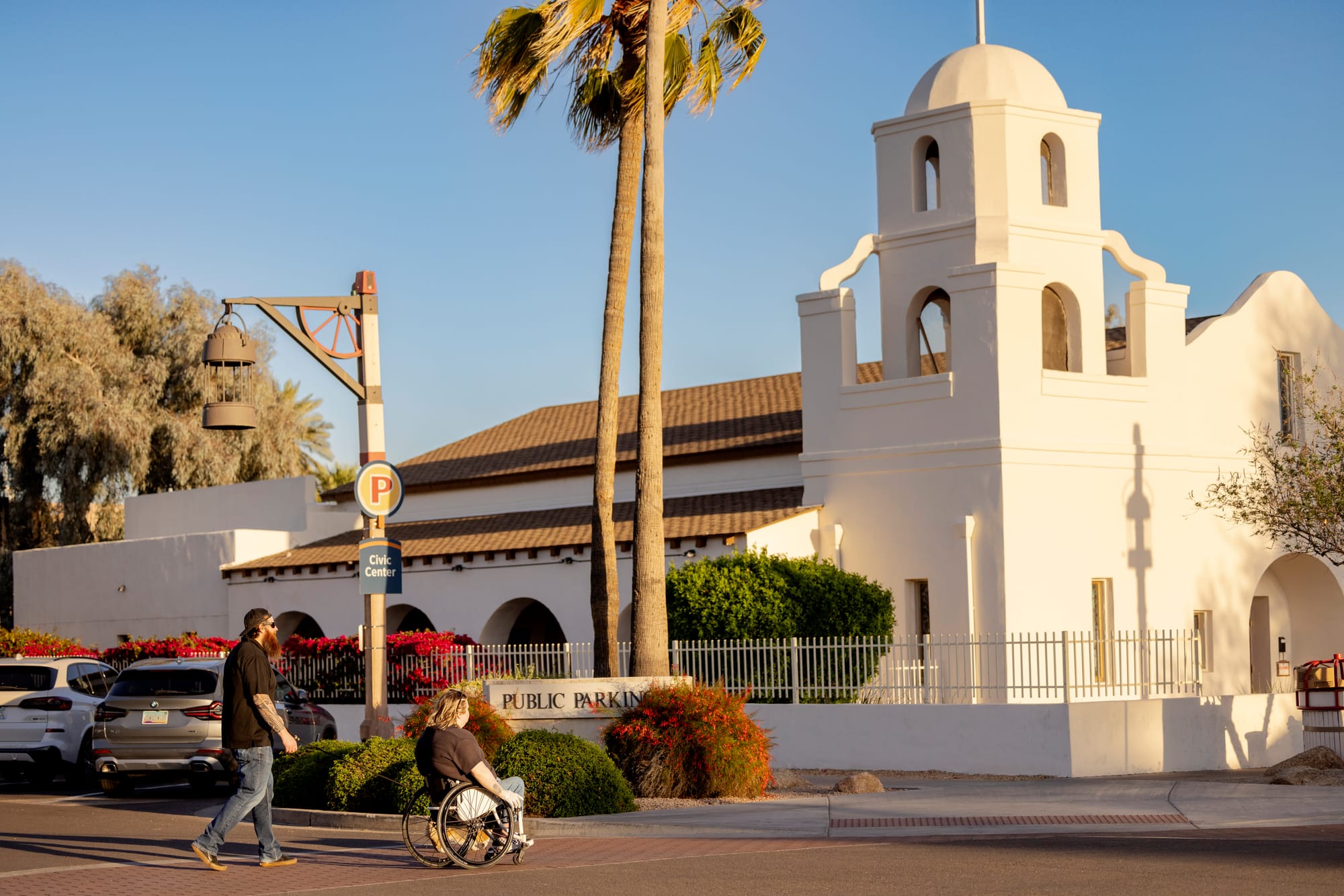 Wheelchair user and companion exploring Old Town Scottsdale, Arizona