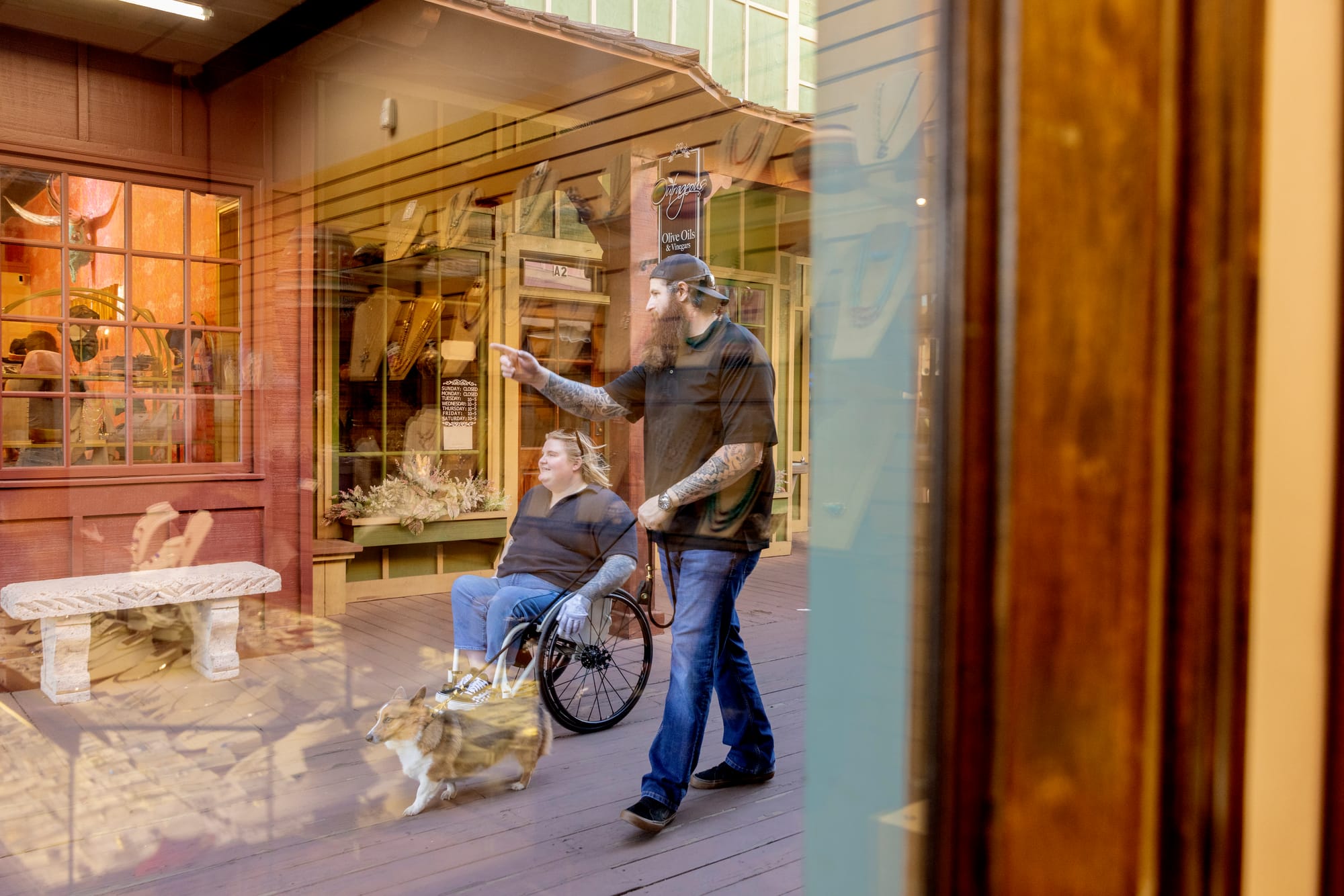 Wheelchair-user and companion exploring Old Town Scottsdale