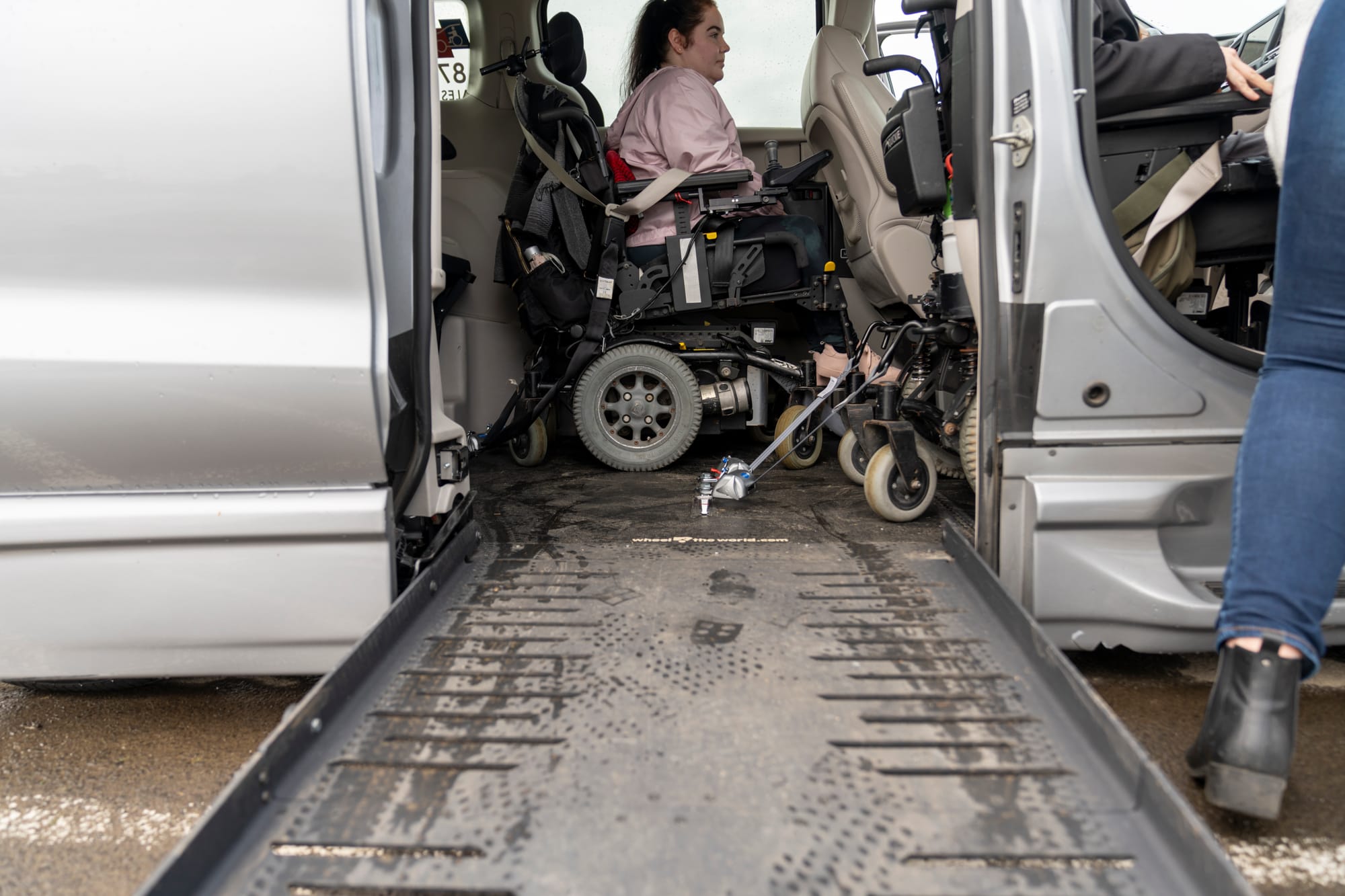 Adapted van rental equipped with a ramp retractable tie downs for wheelchair access