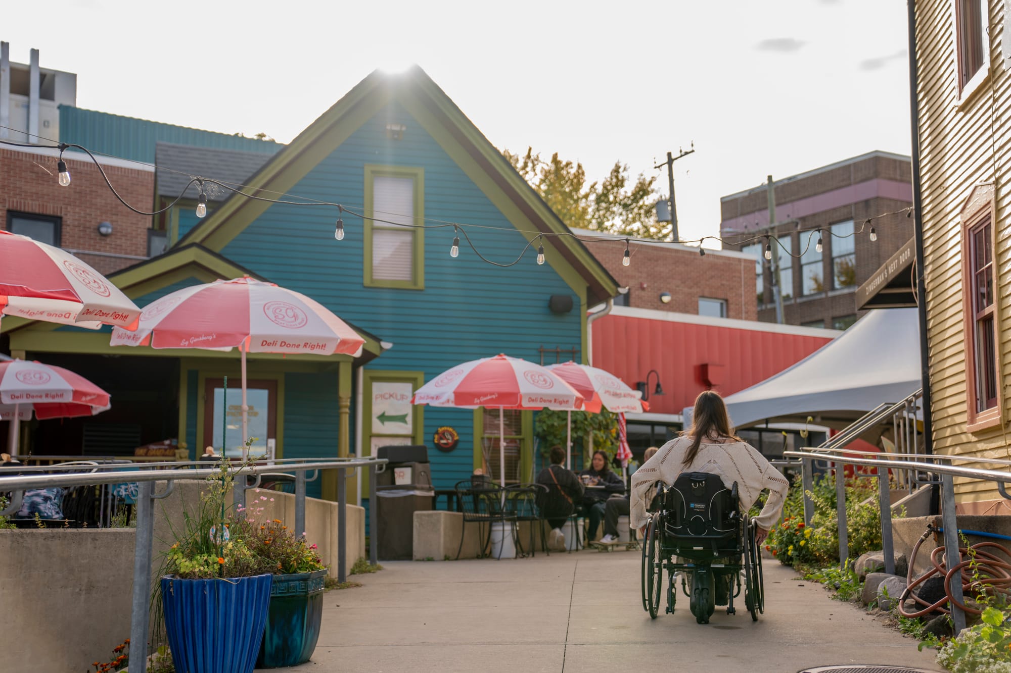 Wheelchair user exploring local shops in Ann Arbor