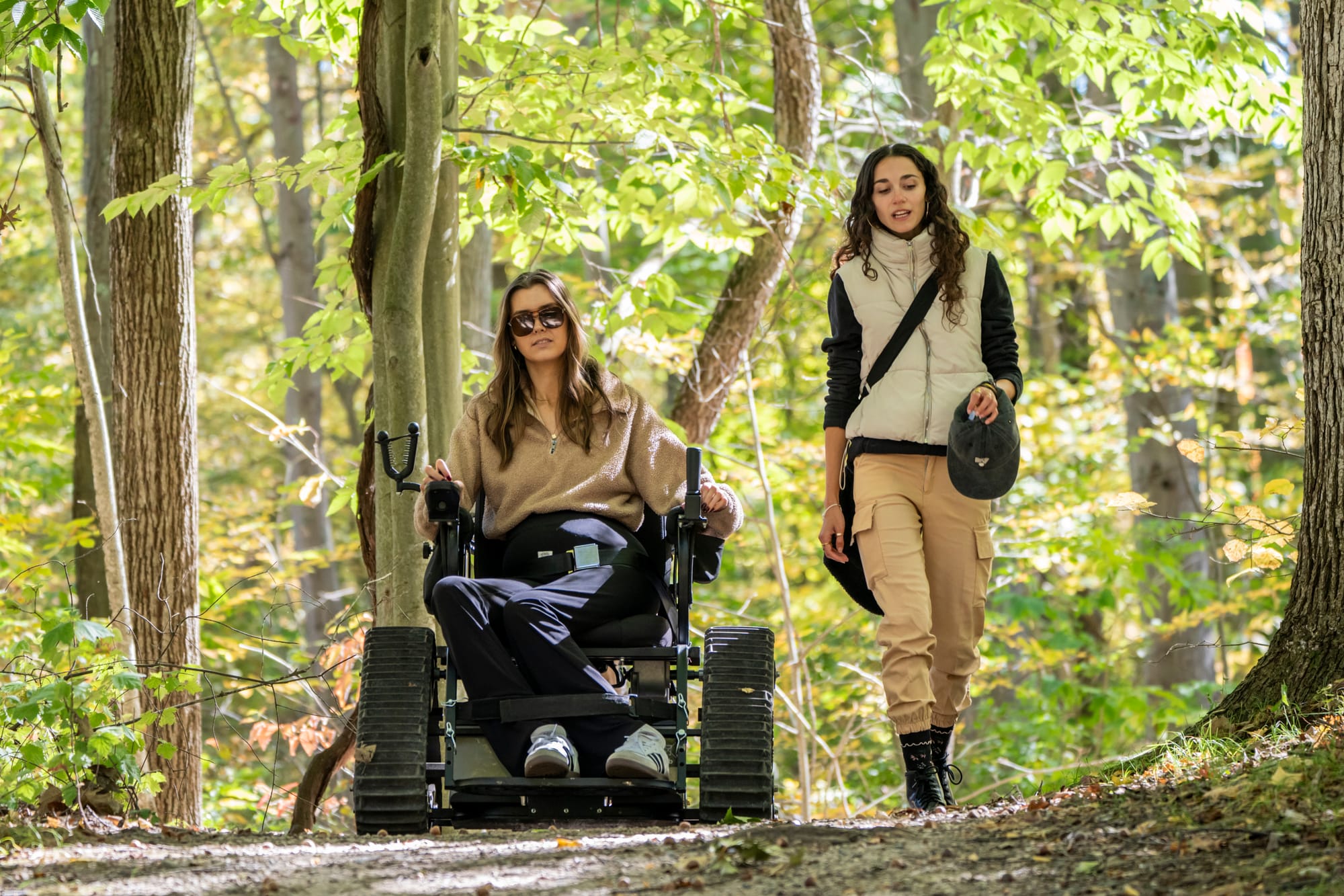 All-terrain wheelchair user exploring Waterloo Recreation Area near Ann Arbor