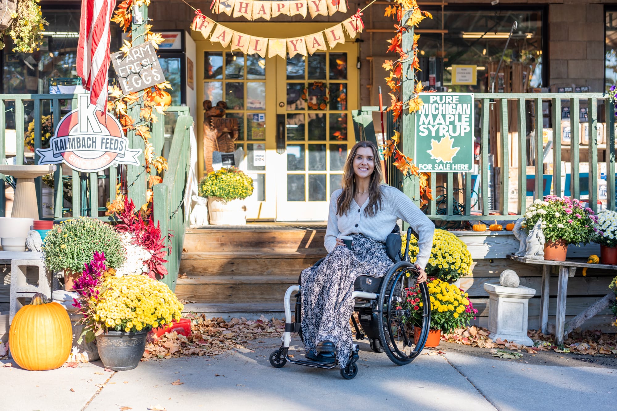 Wheelchair-user enjoying Fall season in Ann Arbor