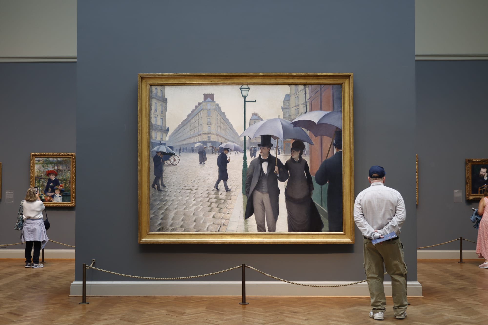 Man enjoying painting at Art Institute of Chicago