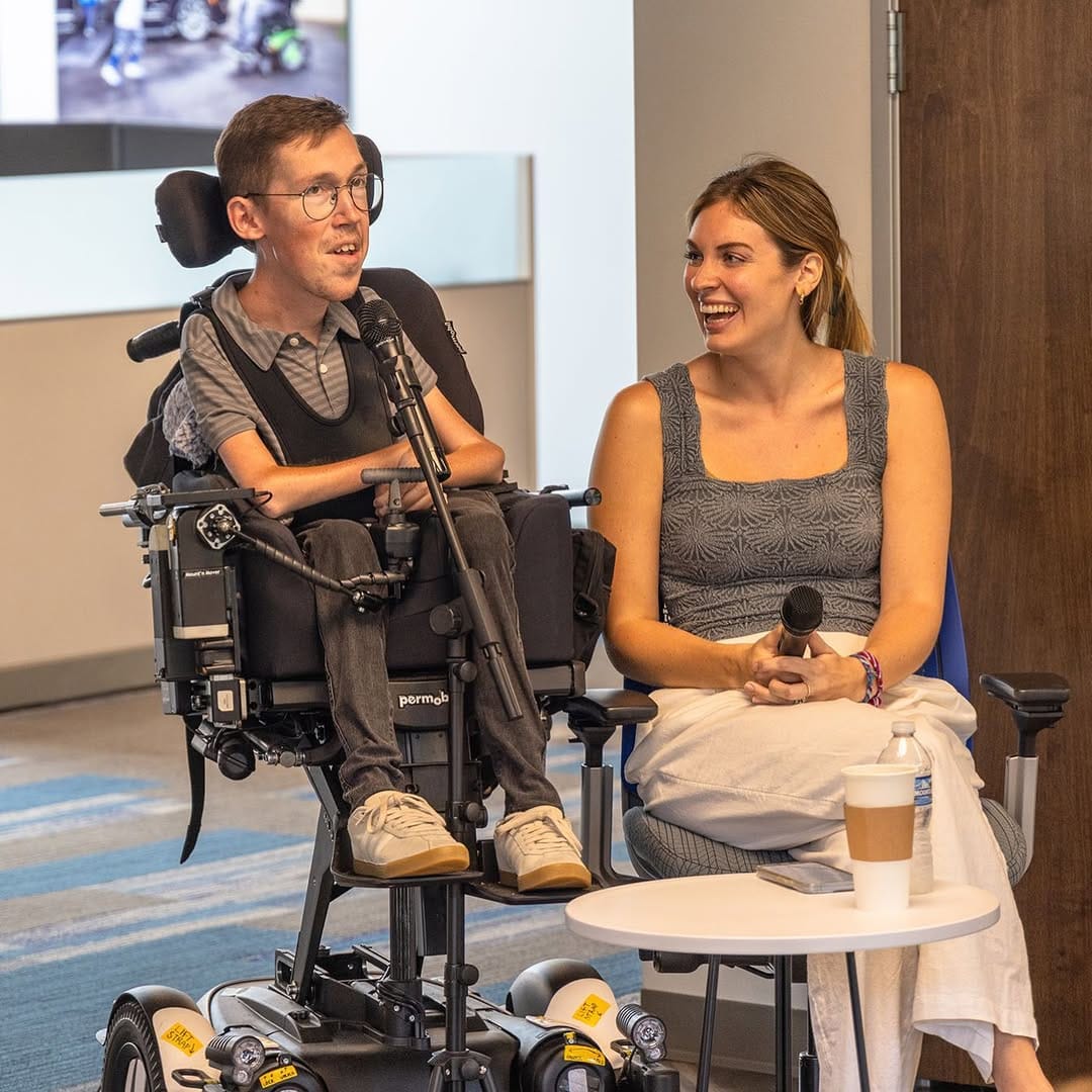 Shane and Hannah Burcaw speaking at a disability event