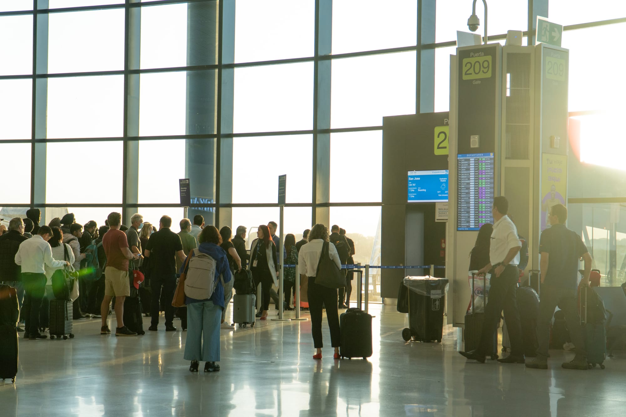 Travelers getting ready to board the airplane