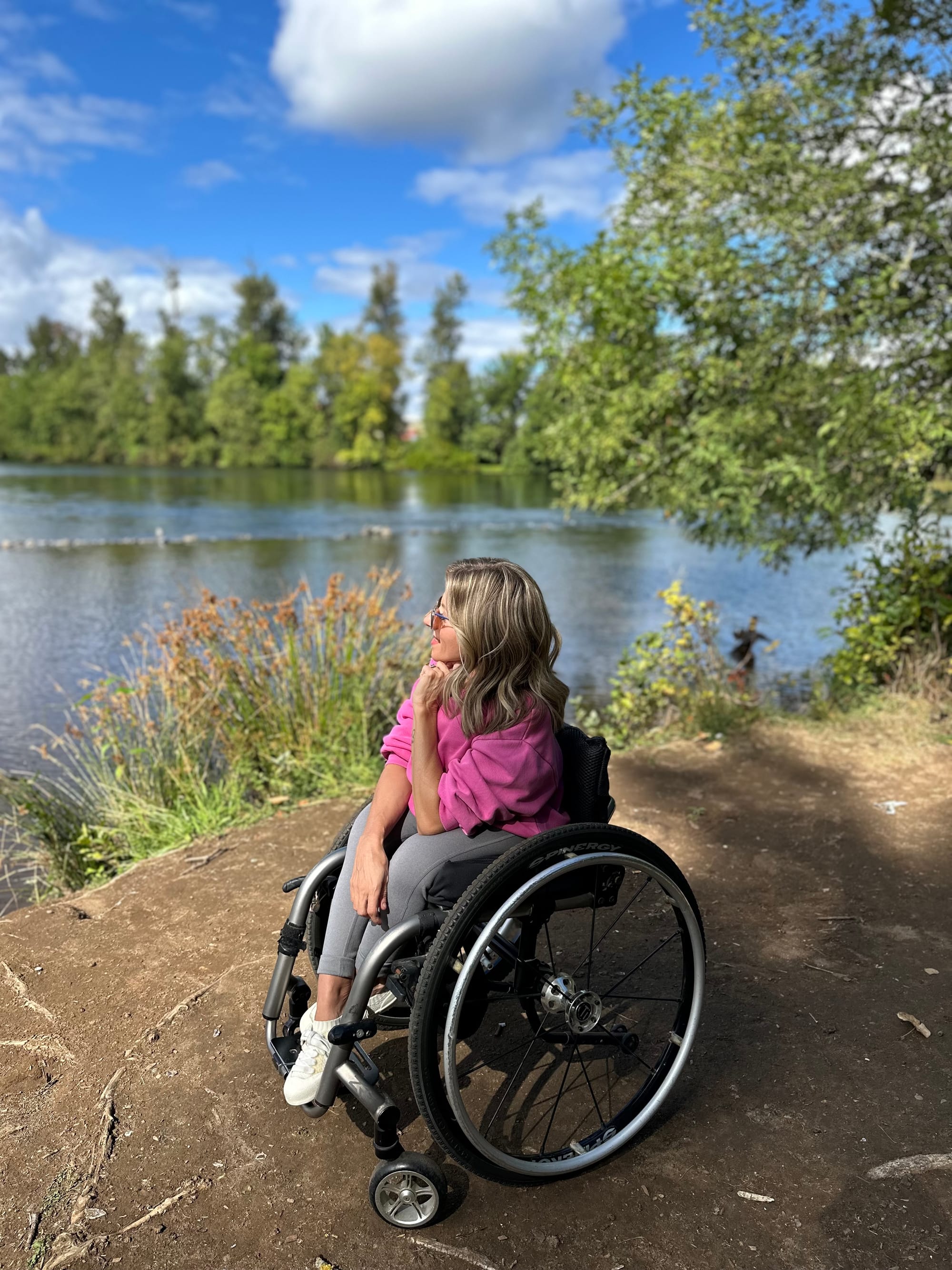 Wheelchair user exploring Delta Ponds in Eugene, Oregon