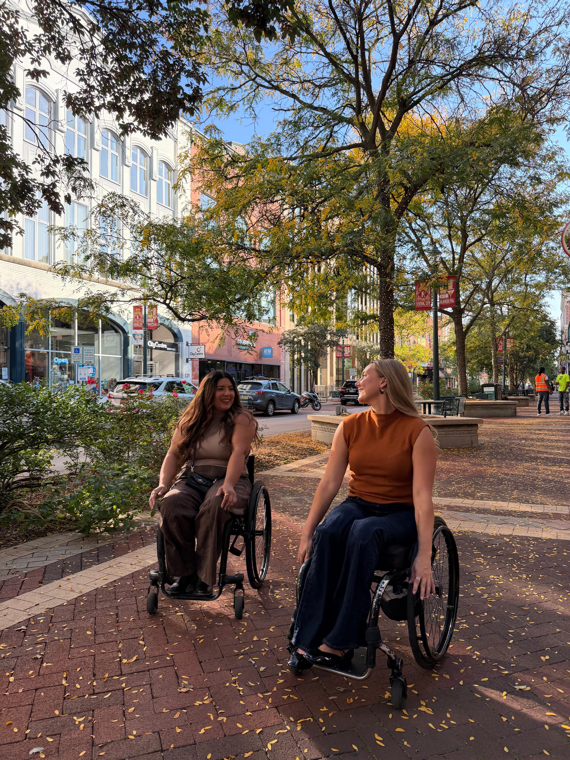 Two wheelchair users in downtown Kalamazoo