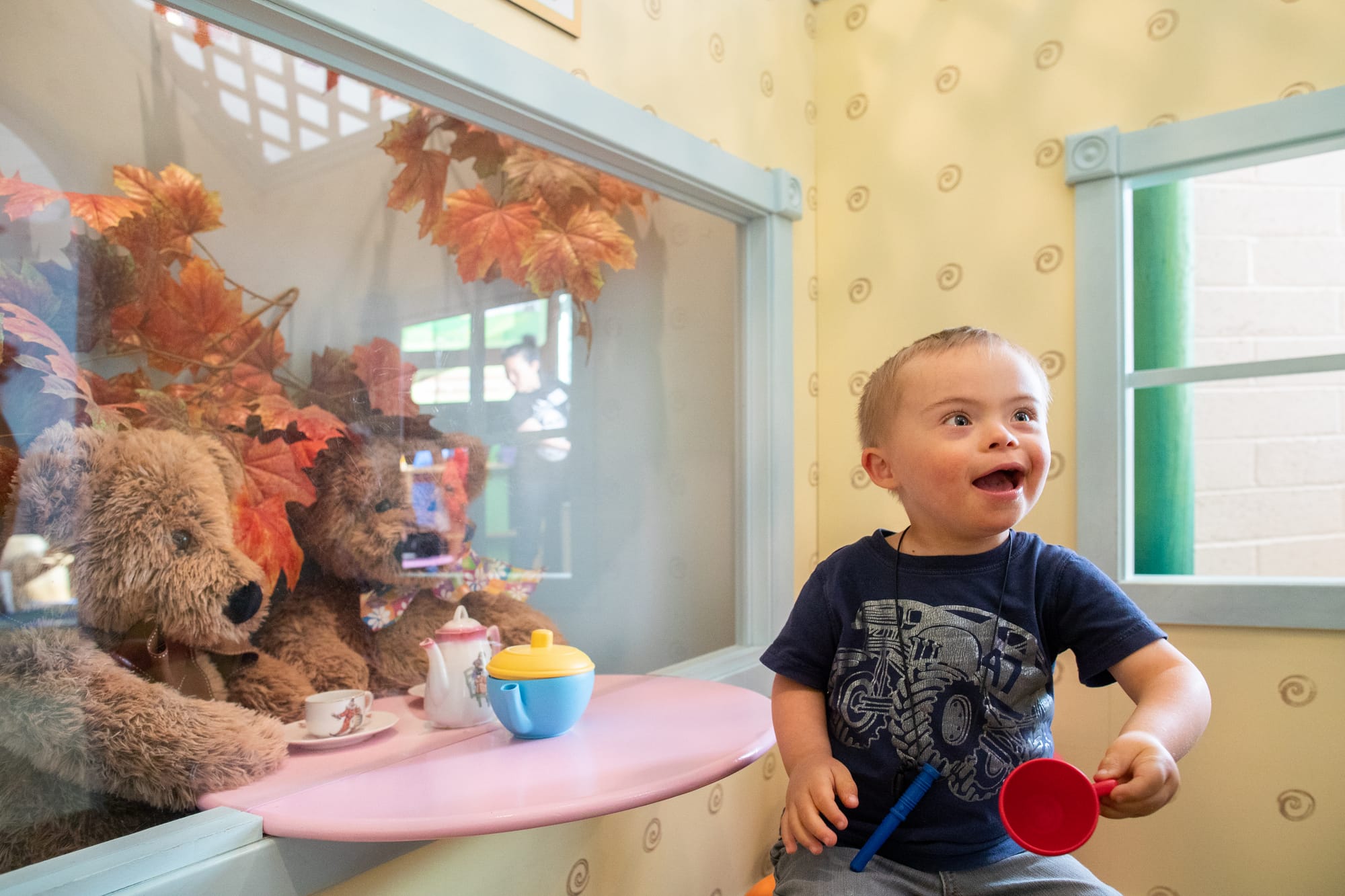Child with Down Syndrome enjoying the Children’s Museum of Sonoma County 