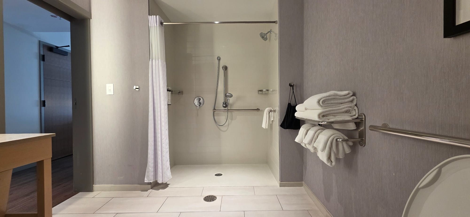 Spacious roll-in shower with grab bars at Hyatt Place Albany, NY