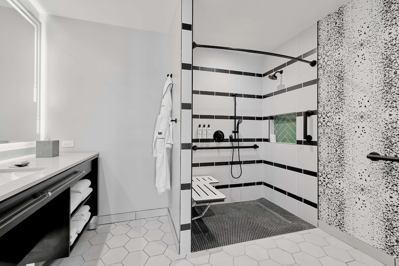 Roll-in shower, grab bars and a seat at The Godfrey Detroit