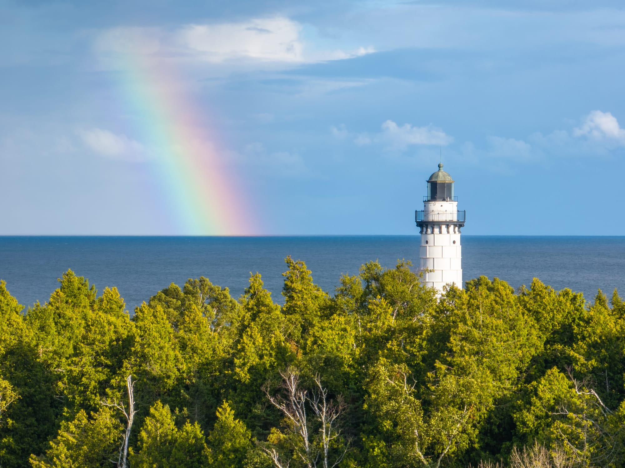 Drone shot of Cana Island with rainbow