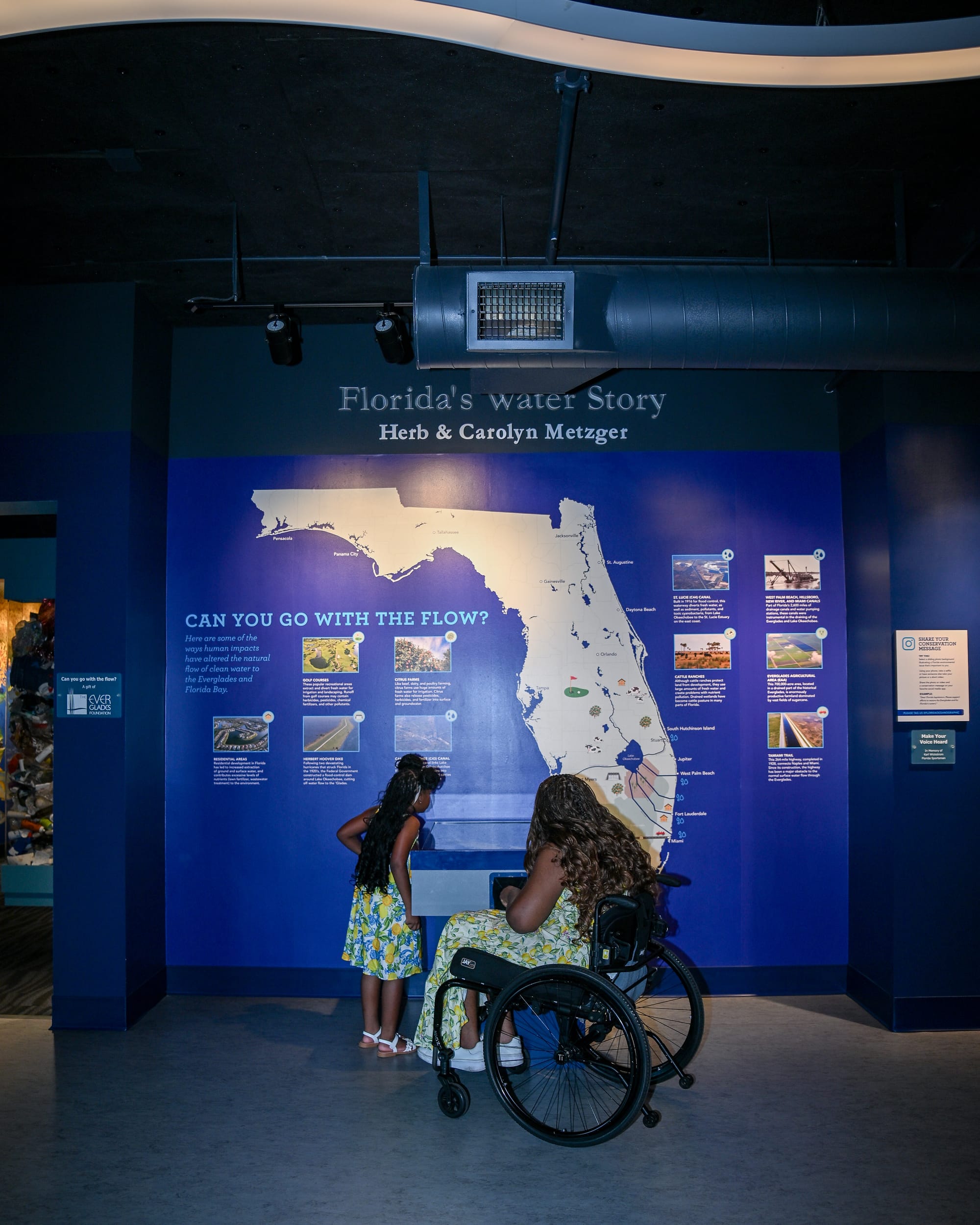 Wheelchair user and daughter at Florida Oceanographic Coastal Center