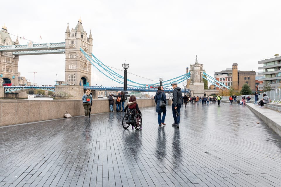 Wheelchair user exploring Tower Bridge in London, UK