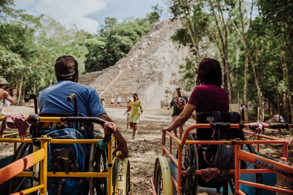 Two wheelchair-users enjoying ruinas in Riviera Maya, Mexico