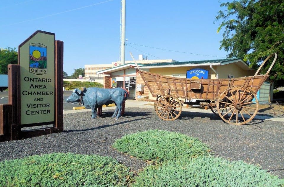 Sign and exhibit in front of Ontario Area Chamber and Visitor Center, Oregon