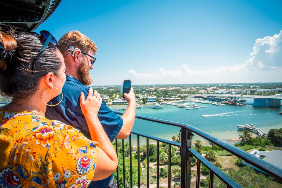 Deaf travelers taking photos on top of Jupiter Lighthouse in Palm Beaches, Florida