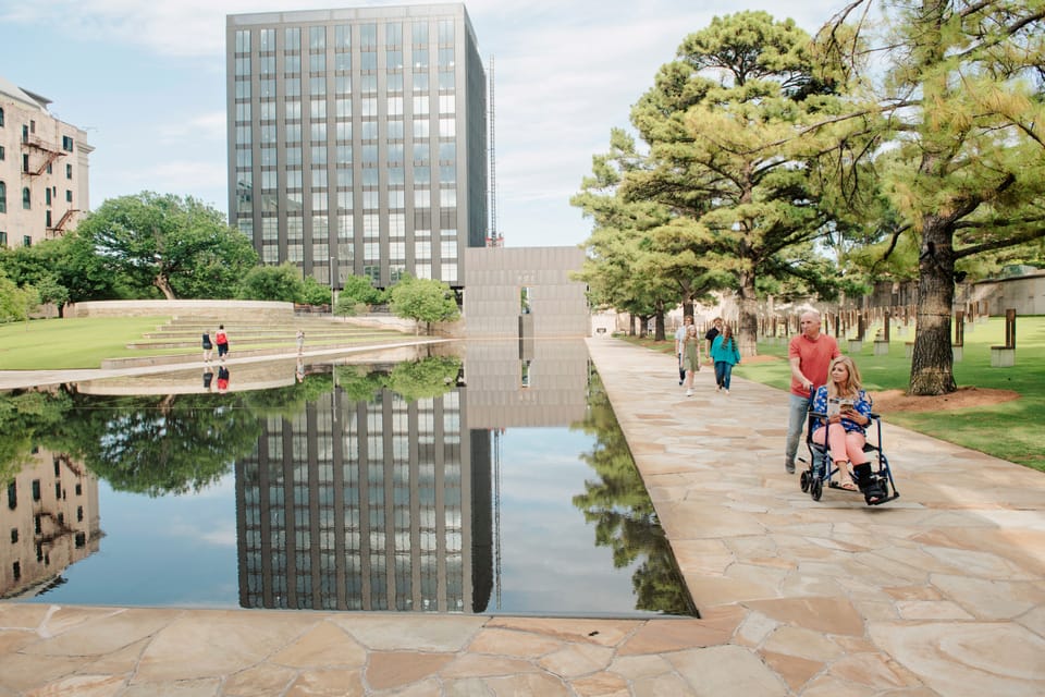 Wheelchair user and companion exploring the National Memorial & Museum in Oklahoma City